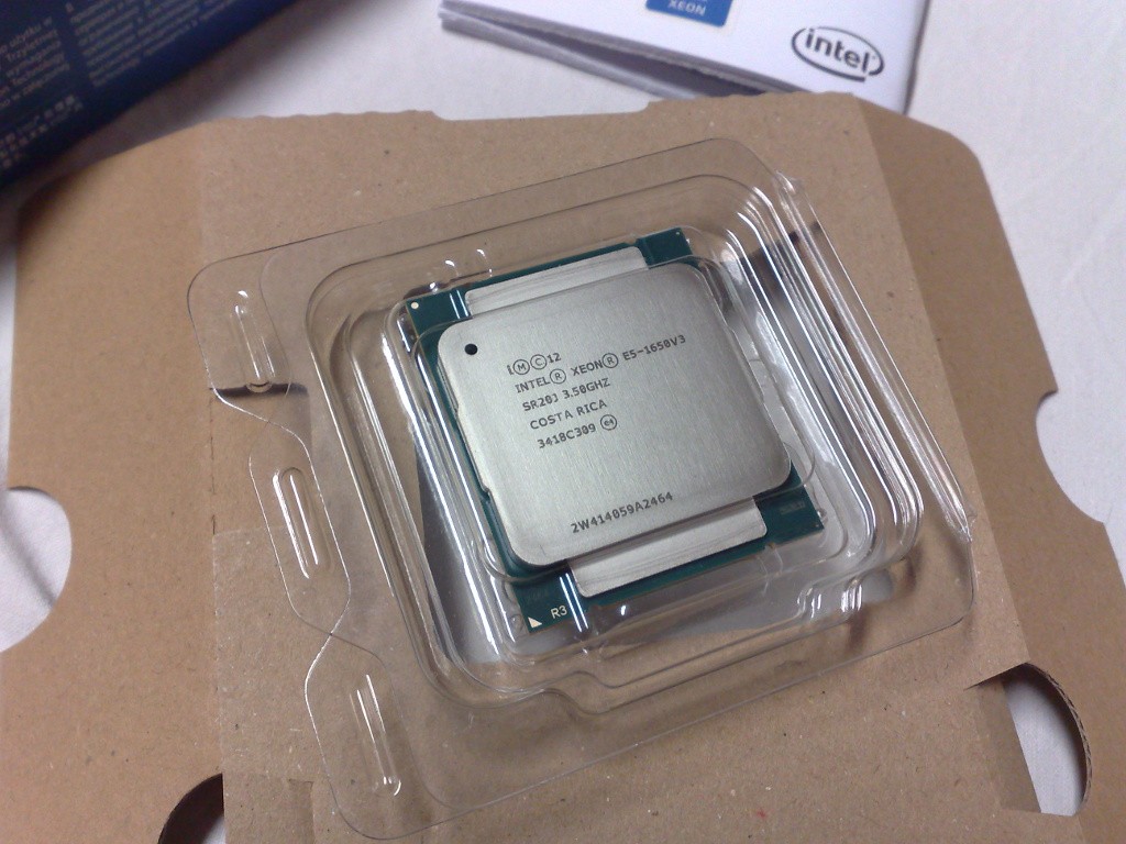 An Intel Xeon E5-1650 v3 processor photographed in 2014; archival hardware, not a current-generation chip.